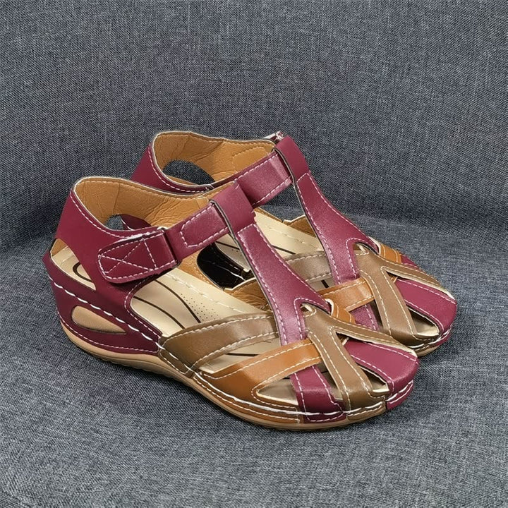 Everyday women's summer flats: multi-strap comfort sandals, cushioned and supportive for active walking.