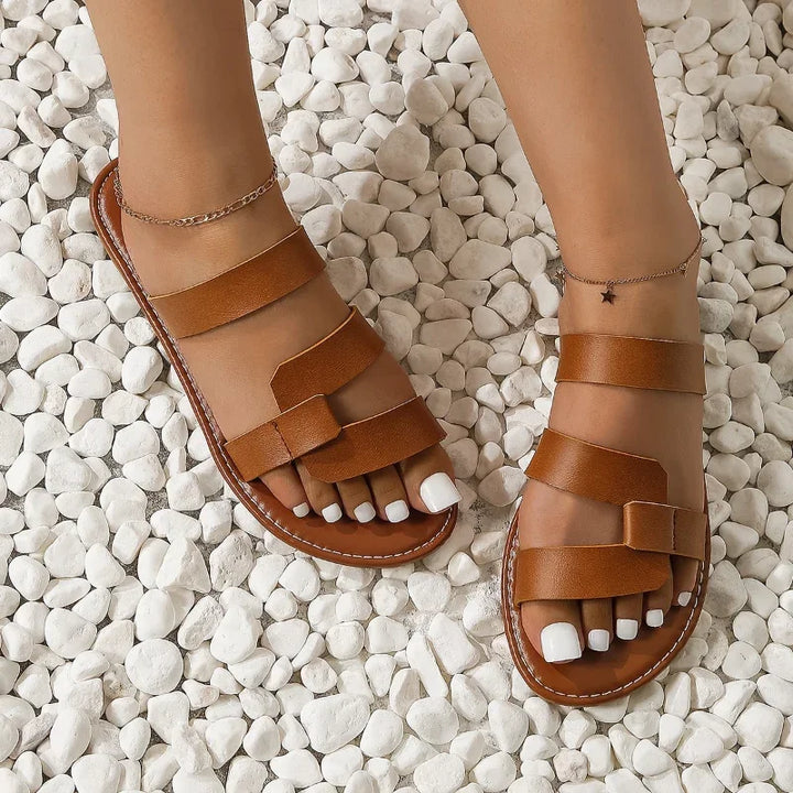 Women's multi-strap flat slide sandals, perfect for summer casual wear & everyday comfort.