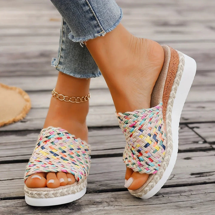 Elegant women's platform espadrille sandals in multicolor woven finish, perfect for casual summer wear.