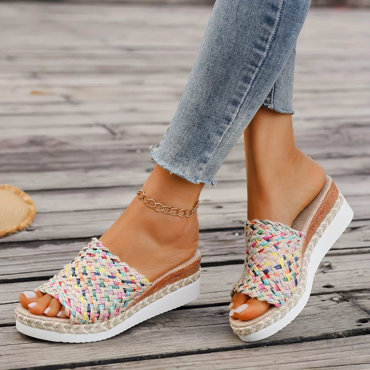Open-toe platform wedge sandals for women, featuring multicolor woven espadrille design, easy slip-on style.
