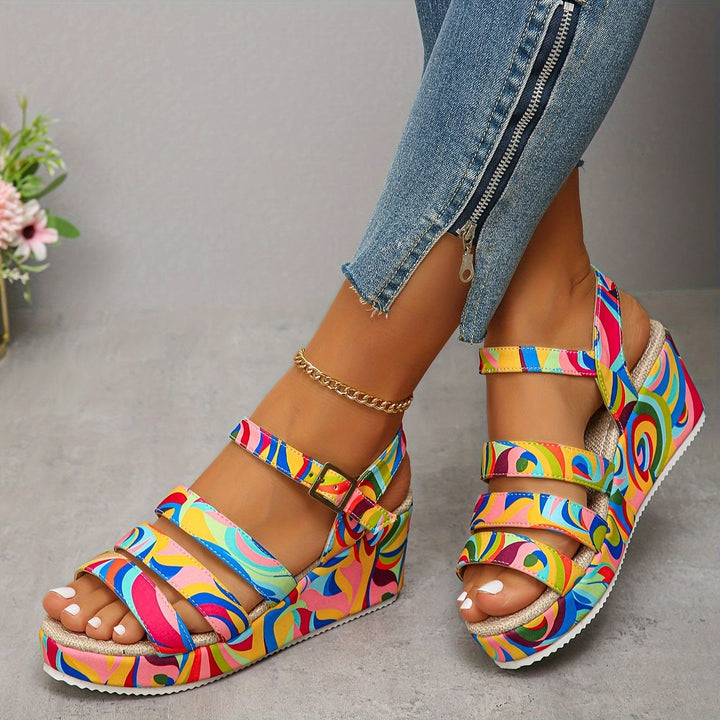 Lightweight multicolour platform wedge sandals for women, featuring an adjustable ankle strap.