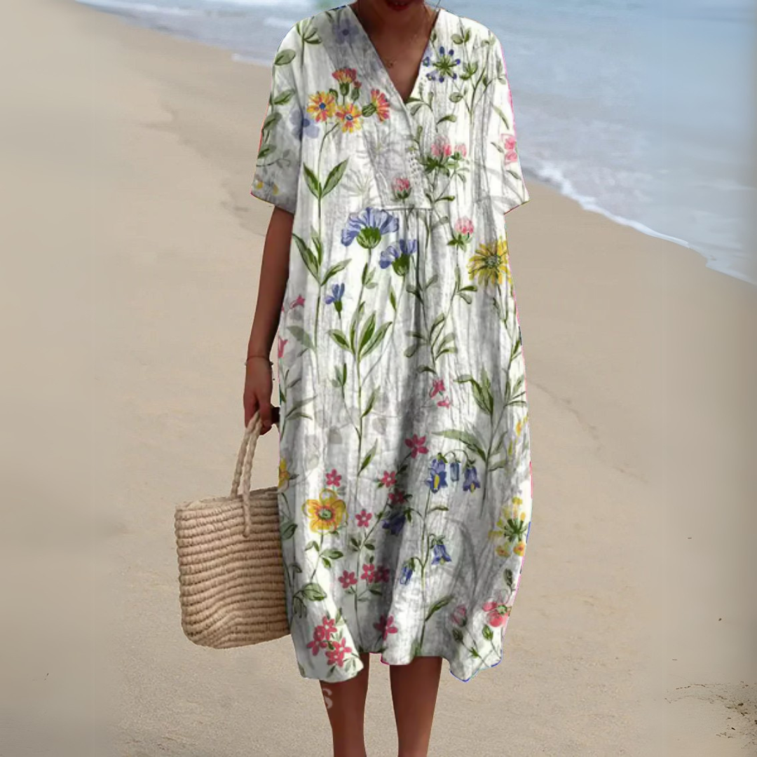 Attractive multicolour V-neck midi dress for women. Stunning floral design, great for any summer occasion.