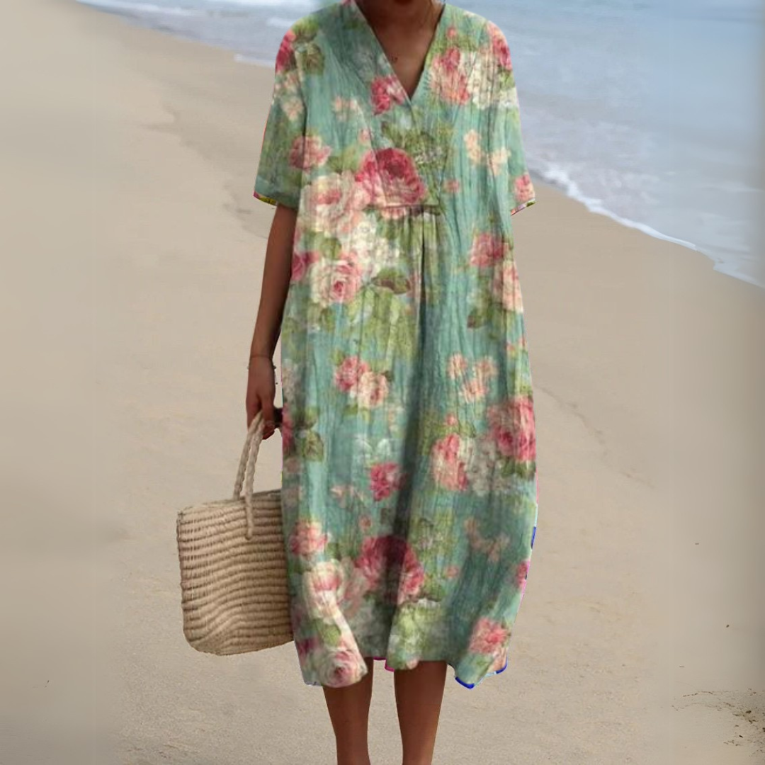 Stunning floral multicolour V-neck midi dress for women. Vibrant, feminine, a summer wardrobe essential.