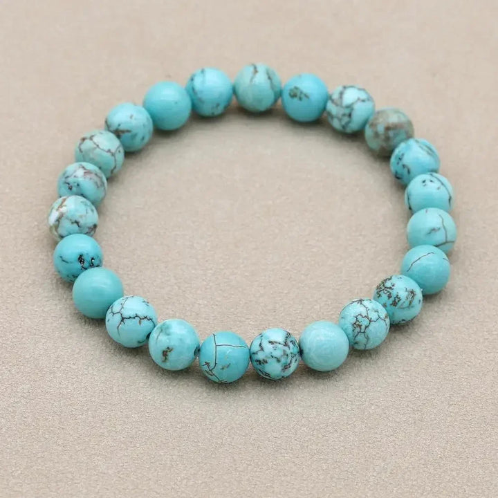 Fashionable women's turquoise beaded stretch bracelet. Genuine natural stone gemstone jewelry accessory.