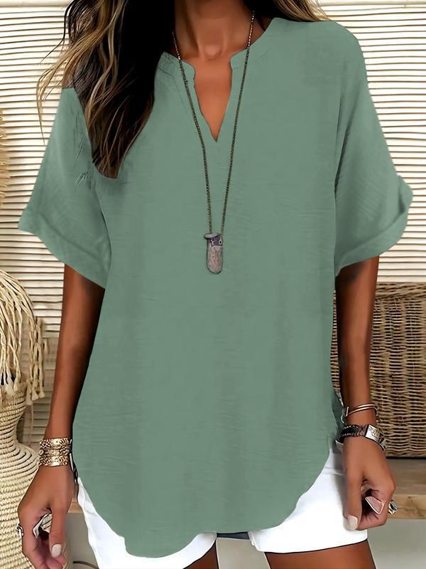 Women's flowy short sleeve notched V-neck blouse, a lightweight & comfortable casual summer top.