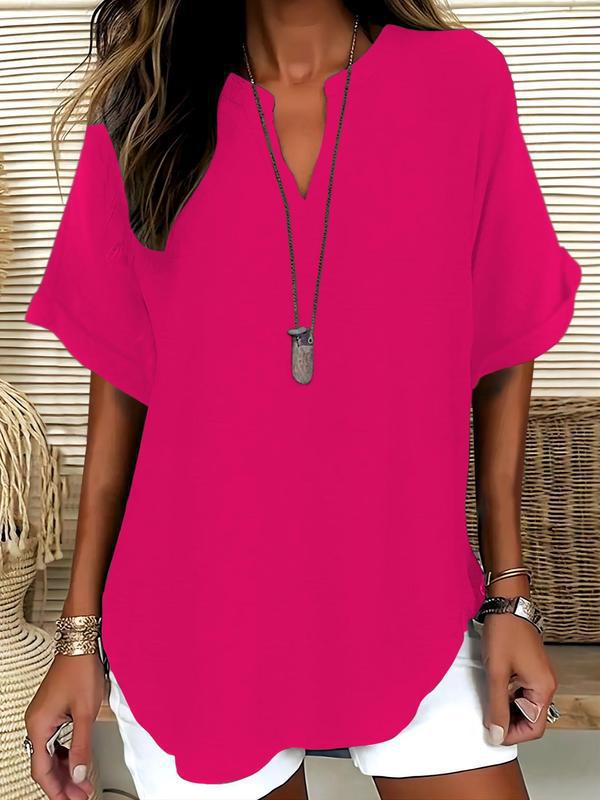 Comfortable women's notched V-neck summer blouse, a lightweight & flowy short sleeve top for everyday elegance.