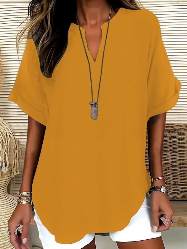 Women's elegant notched V-neck blouse, a flowy short sleeve summer top offering ultimate lightweight comfort.