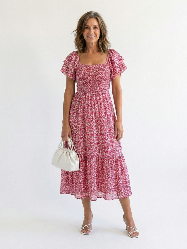 Women's off-shoulder floral smocked midi dress with puff sleeves, perfect for summer casual wear or vacation.