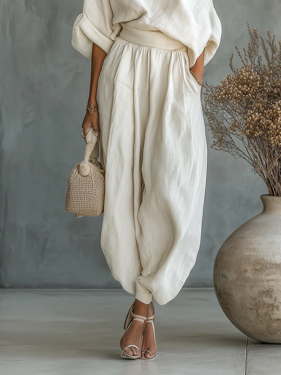 Stylish off-white off-shoulder two-piece outfit for women, featuring a relaxed fit for summer/autumn fashion.