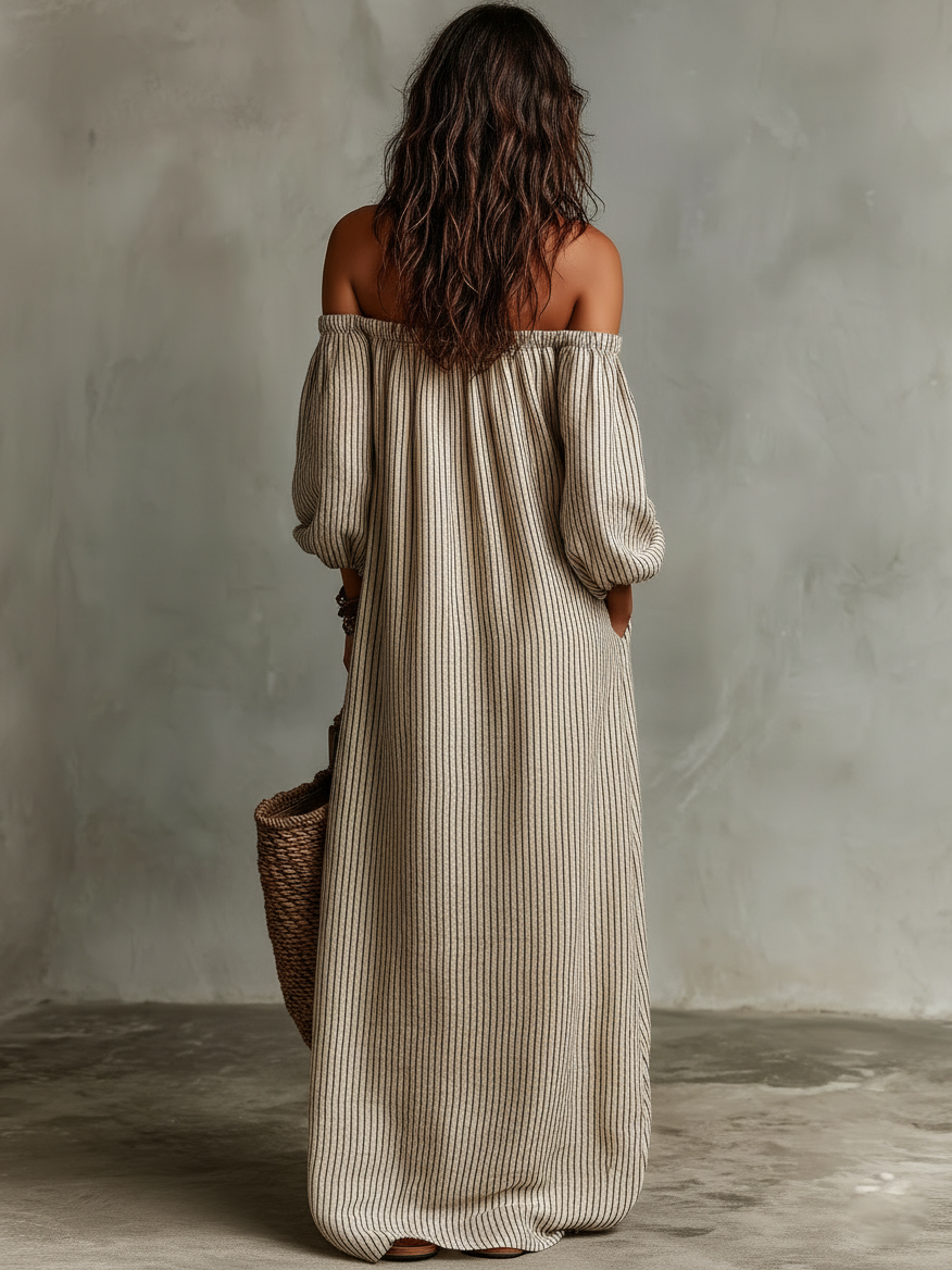 Comfortable women's striped maxi dress with off-shoulder neckline & puff sleeves, ideal for autumn.