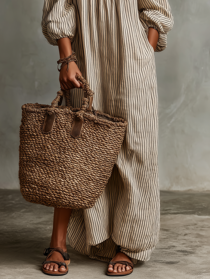Distinctive off-shoulder striped puff sleeve maxi dress for women, elegant and airy for warm days.
