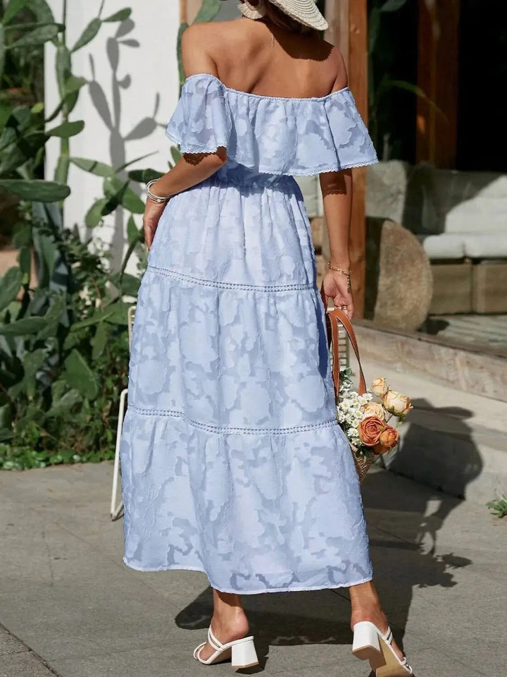 Vibrant off-shoulder tiered ruffle maxi dress, ideal for beach outings and leisurely summer days.