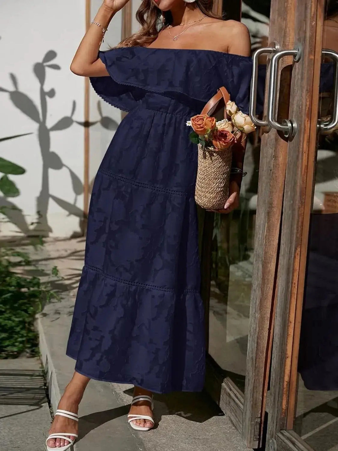 Flowy off-shoulder tiered ruffle maxi dress, ideal for summer parties & chic wedding guest attire.