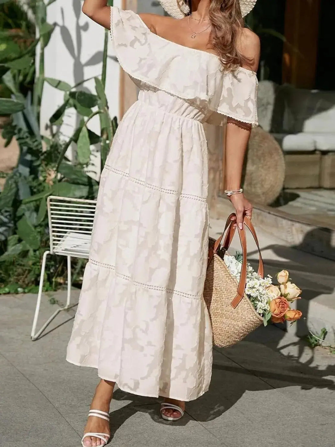 Casual yet stunning off-shoulder tiered ruffle maxi dress, great for beach days & summer evenings.
