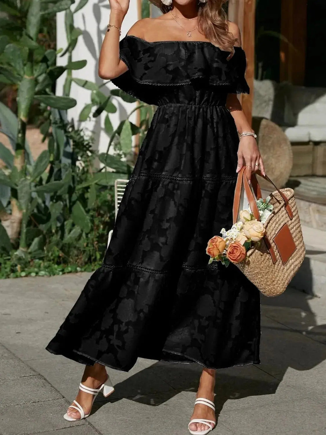 Stylish off-shoulder maxi summer dress with tiered ruffles, enhancing your vacation look.