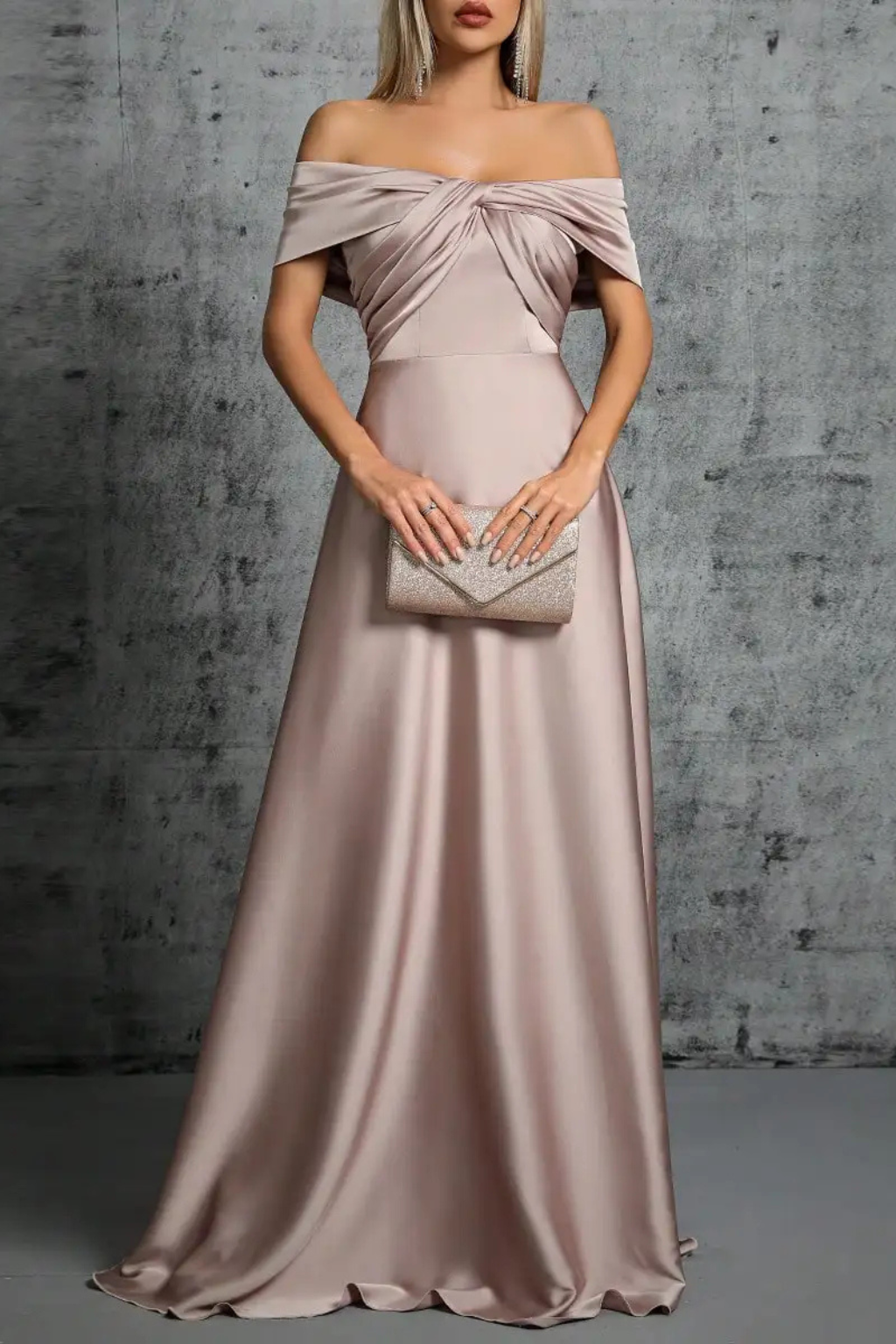 Women's elegant off-shoulder long dress, pleated maxi with a stylish twisted knot.