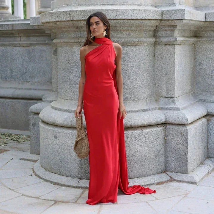 Women's one-shoulder backless maxi dress, draped, long, and elegant evening wear.