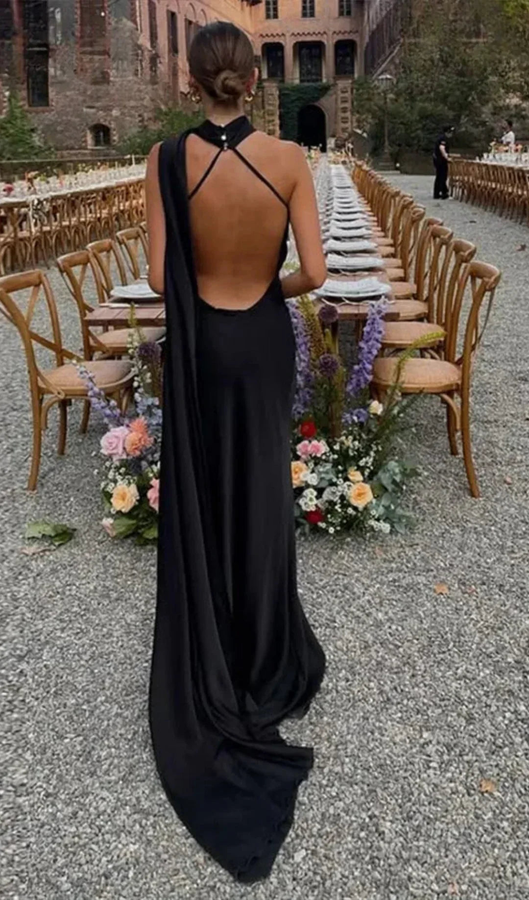 Elegant women's one-shoulder draped backless maxi dress, ideal evening wear.