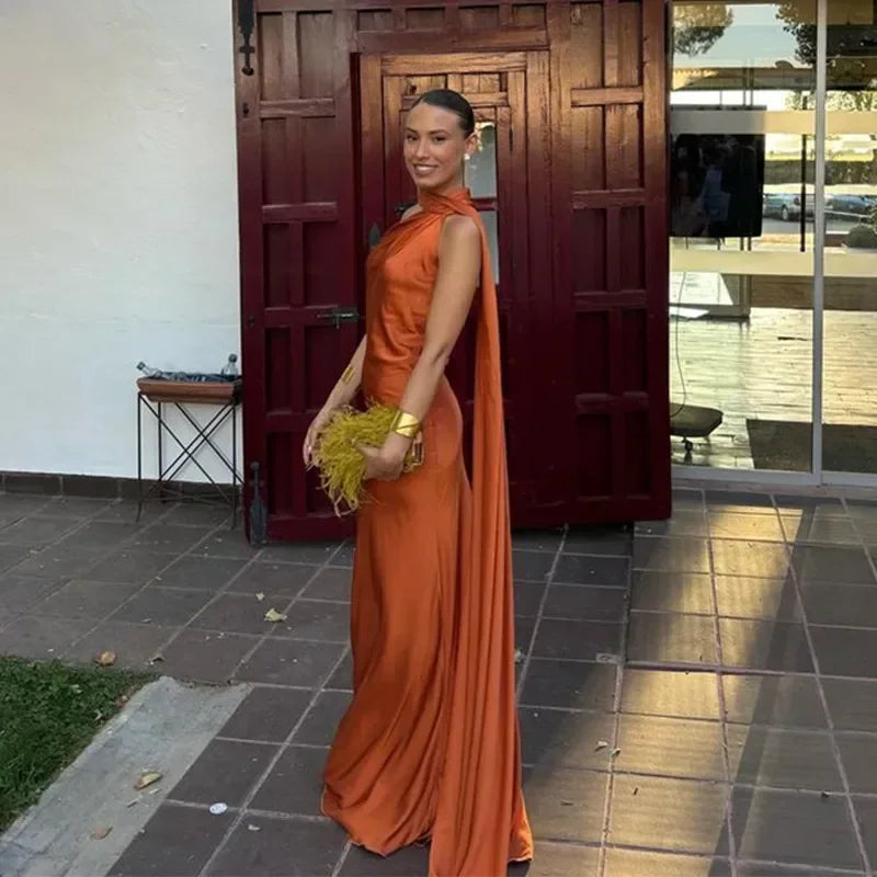 Women's draped one-shoulder backless maxi dress, long and elegant for special events.