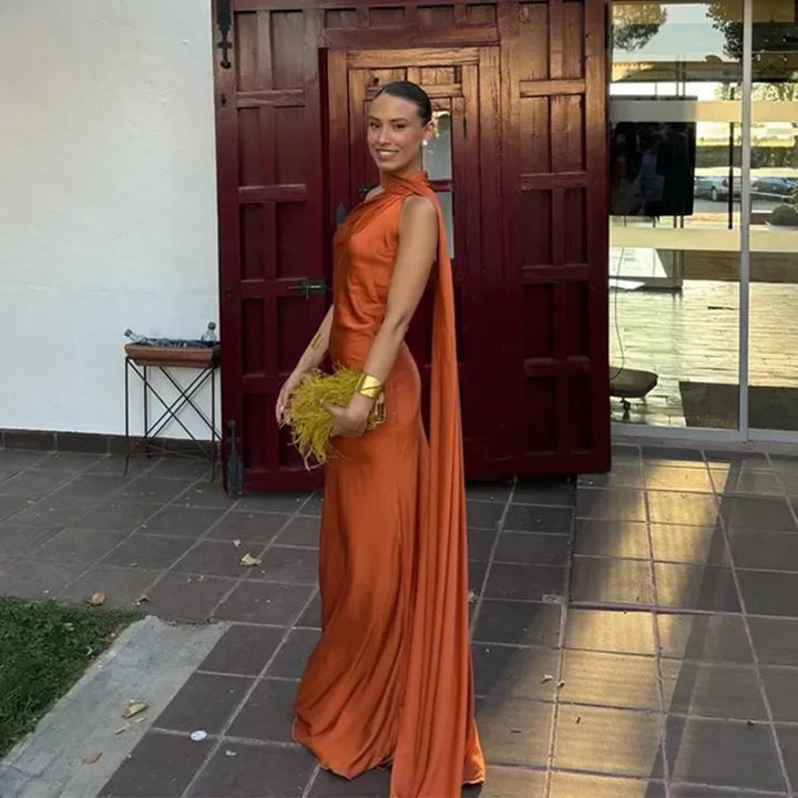 Women's draped one-shoulder backless maxi dress, long and elegant for special events.
