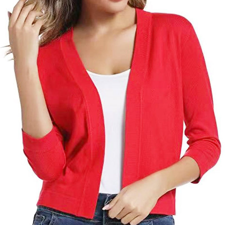 Stylish women's 3/4 sleeve open front cardigan, perfect for layering during fall.