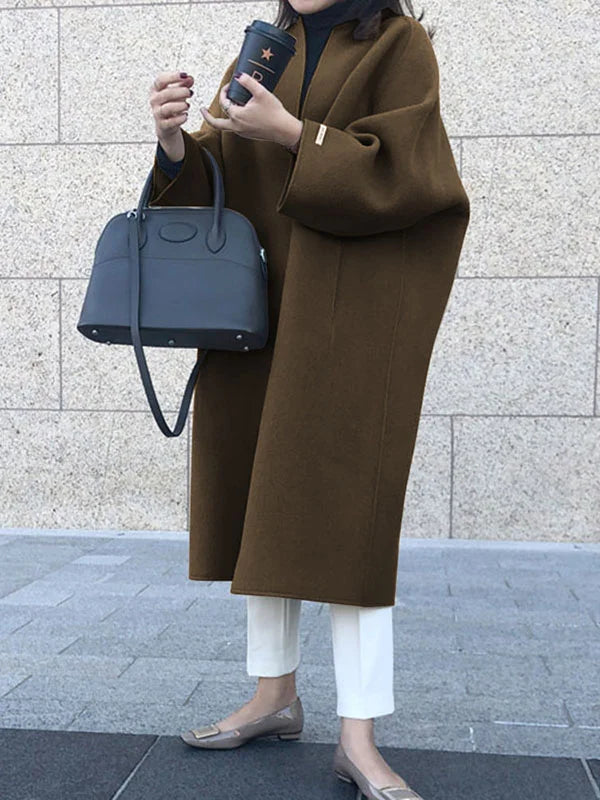Stylish women's oversized winter coat, an open front design for a chic and comfortable look.