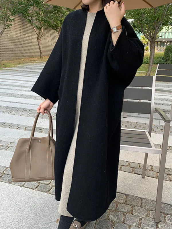 Elegant long coat for women, perfect casual outerwear with cozy warmth and a versatile open front.