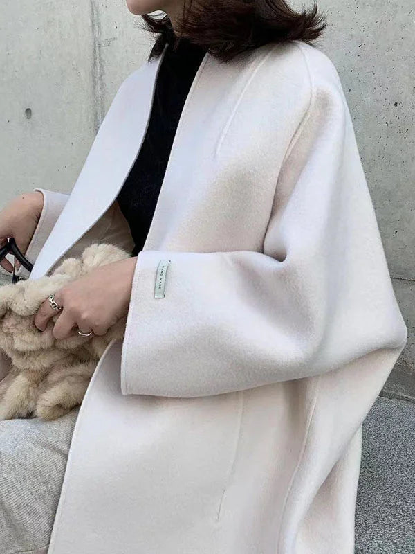 Effortless style with this women's open front long coat, a comfortable and elegant piece for any wardrobe.
