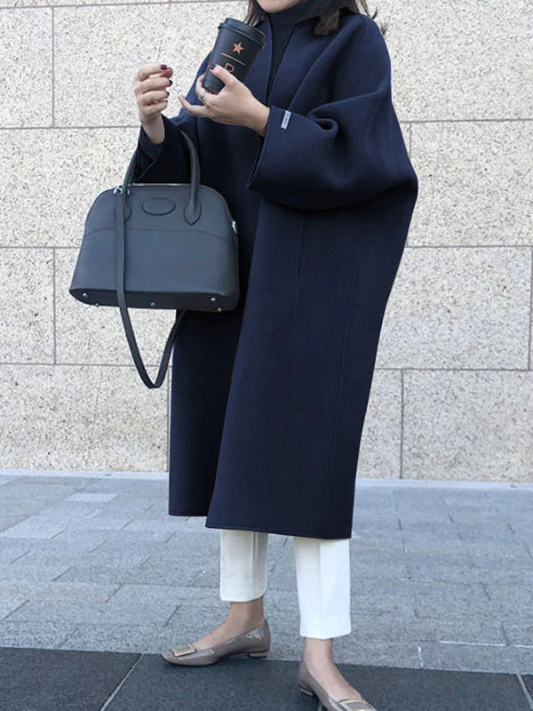 Warm women's open front coat, an oversized design for a modern look and ultimate comfort in winter.
