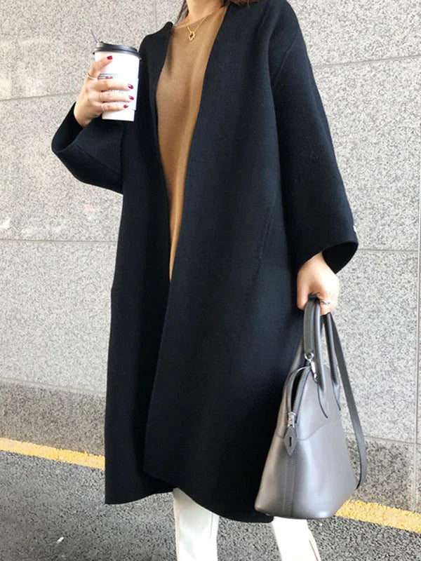 Soft women's winter coat, featuring an open front and long silhouette for cozy, stylish outerwear.