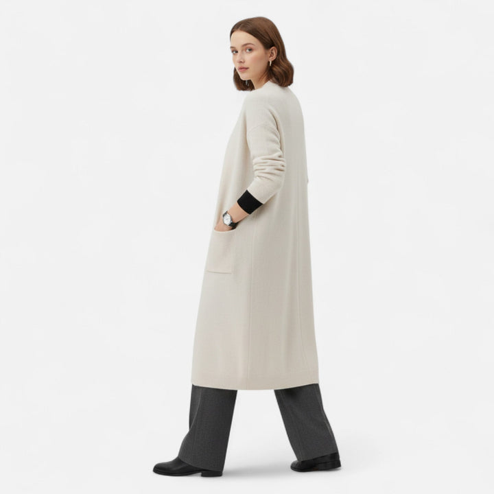 Cozy womenswear long cardigan, featuring a relaxed open-front silhouette for easy layering.