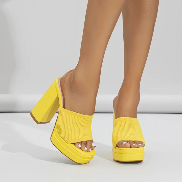 Side profile of comfortable women's open-toe platform heeled sandals, highlighting chunky heel & platform sole.