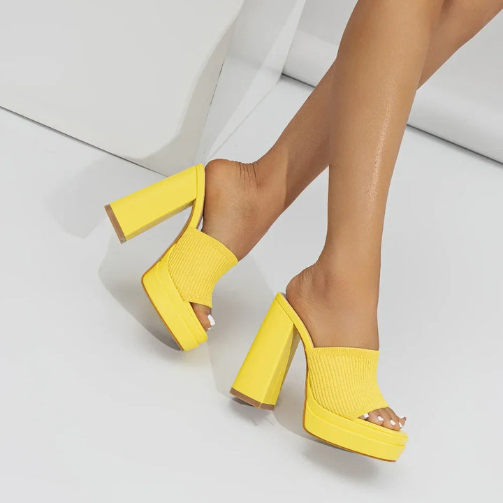 Back view of women's open-toe platform heeled sandals, emphasizing the comfortable chunky heel & ankle strap.