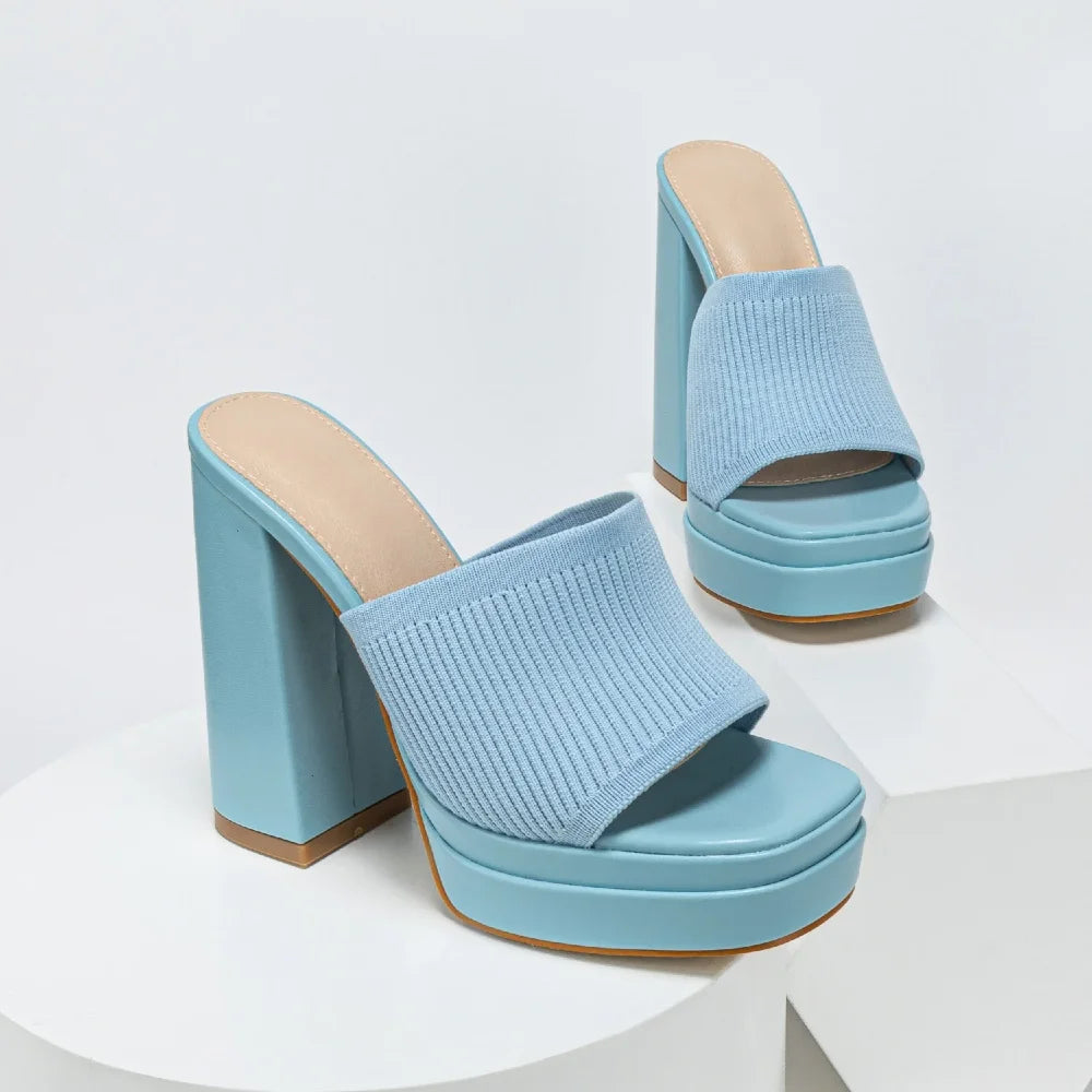 Walk with ease in these women's open-toe platform heeled sandals, comfortable chunky heel & adjustable strap.