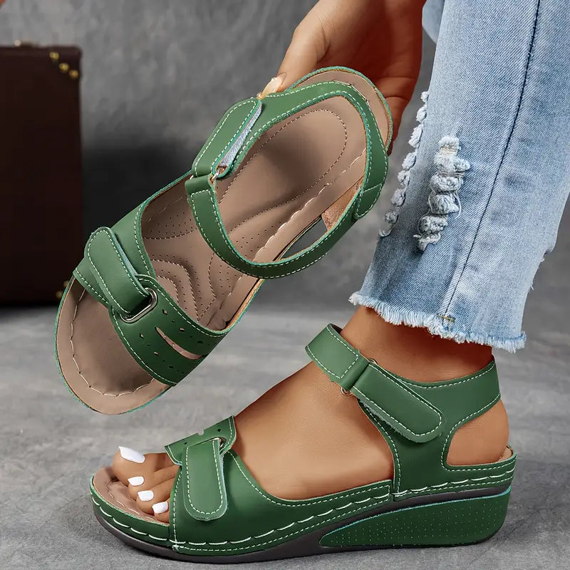Chic women's open toe platform sandals featuring a secure ankle strap & comfortable design.