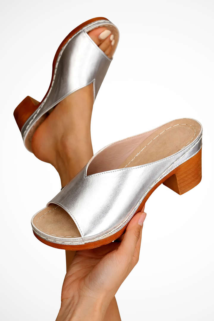 Chic women's open toe slip-on mules with a sturdy block heel. Versatile footwear for any occasion.