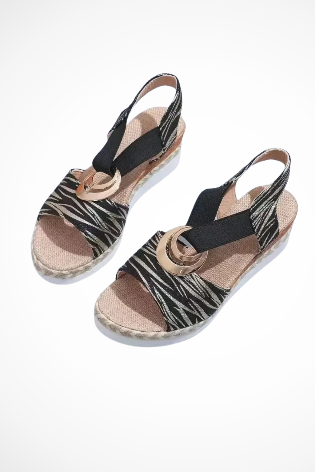 Women's open toe wedge sandals. Elegant and comfortable summer shoes with a distinctive ring detail.