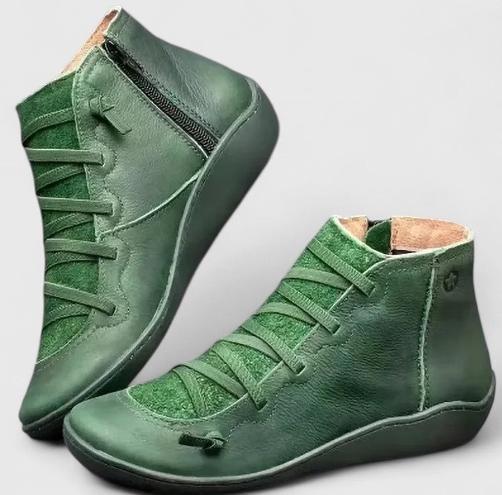 Durable brown leather women's orthopaedic ankle boots, providing superior comfort and support for daily use.