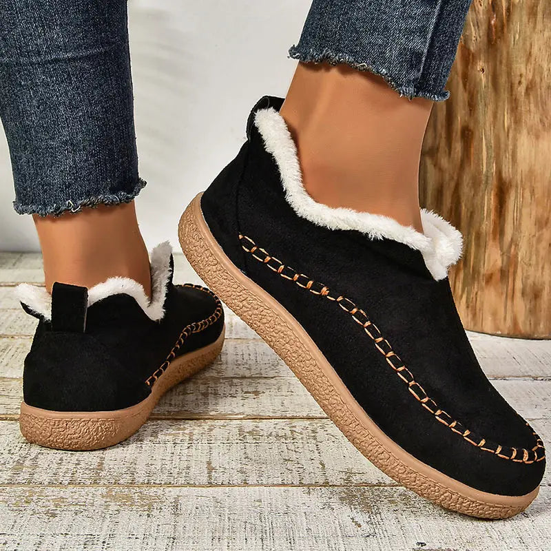 Comfortable women's orthopaedic ankle boots with supportive design. Plush lining & non-slip sole for winter & fall fashion.