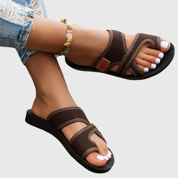 Comfortable women's walking sandals with orthopaedic design, arch support, and adjustable fit.