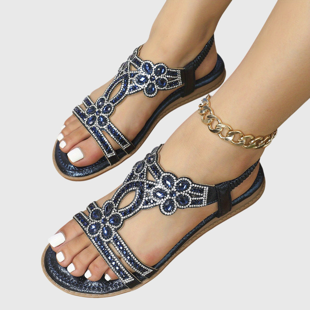 Elegant women's comfort footwear, orthopaedic design, adjustable back strap for support.