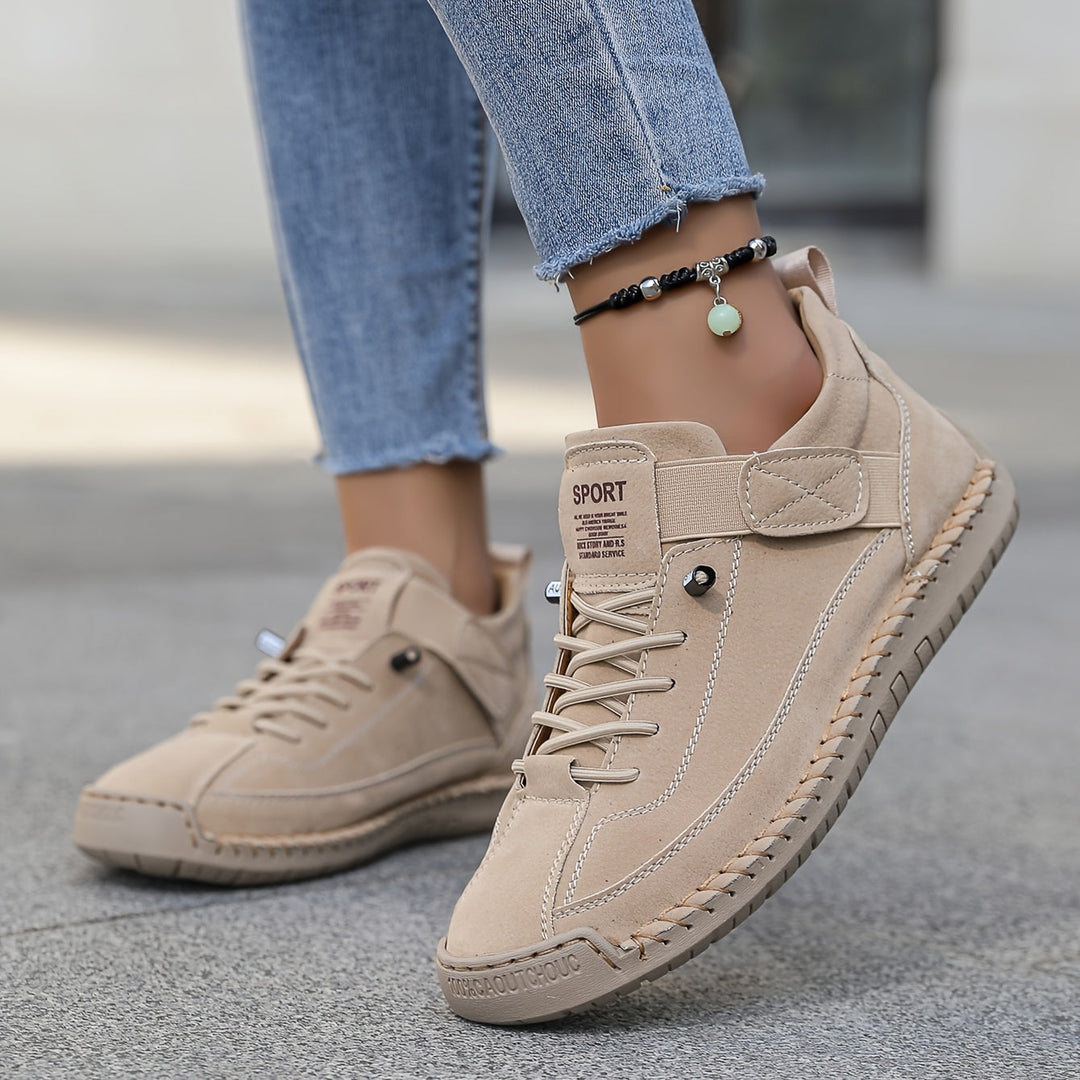 Cushioned women's orthopaedic trainers with arch support, providing foot relief & everyday comfort.