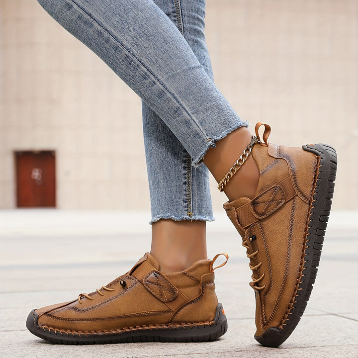 Side profile of women's orthopaedic walking shoes, designed for supportive footwear & foot relief.