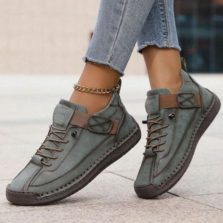 Close-up of women's orthopaedic comfort trainers, highlighting arch support and quality design.