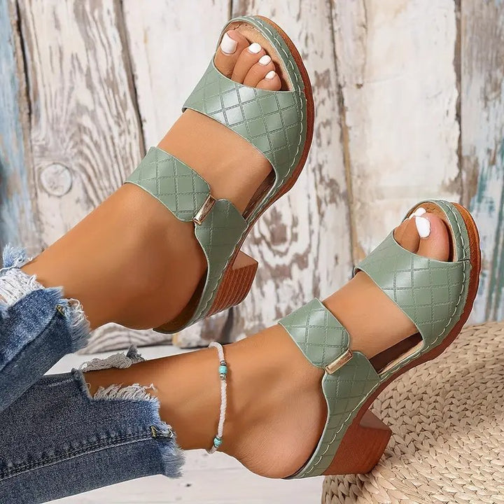 Cushioned women's sandals: orthopaedic block heel design with superior arch support.