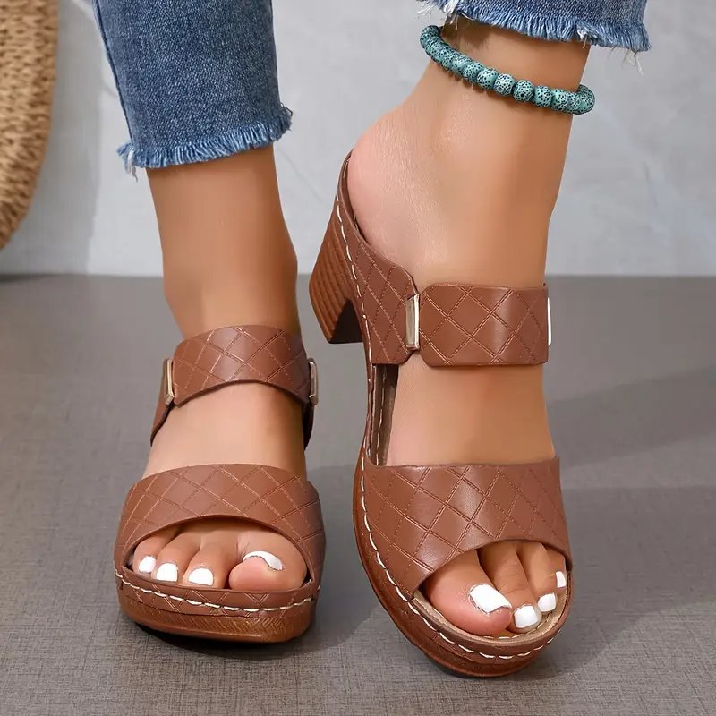 Comfortable women's orthopaedic sandals with supportive arch and cushioned block heel.