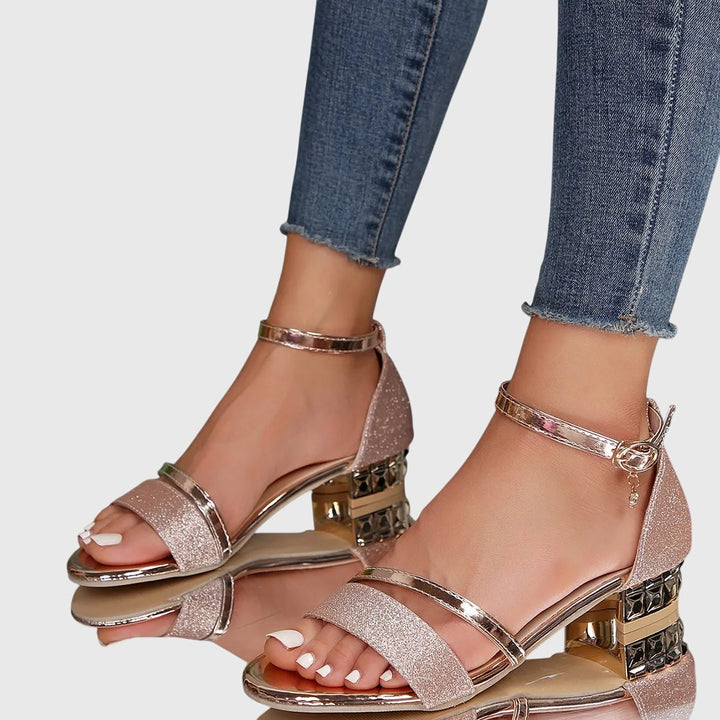 Close-up: Adjustable strap detail on women's orthopaedic heeled sandals for a perfect fit & comfort.