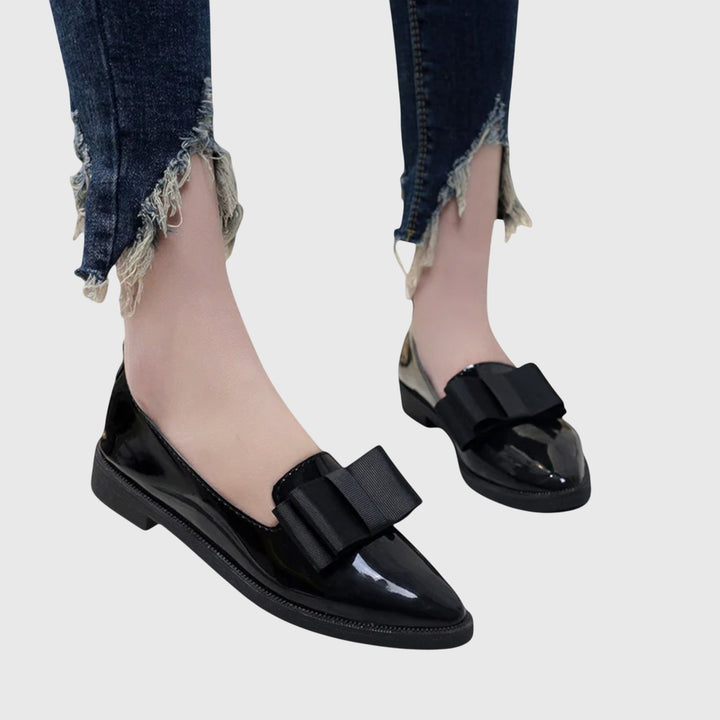 Comfortable women's slip-on loafers, ideal orthopaedic walking shoes with a classic flat-heel style.