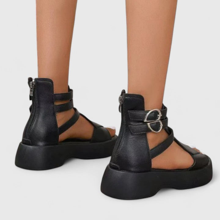 Stylish women's comfort platform sandals with orthopaedic support, multi-strap design, zip closure & buckle detail.