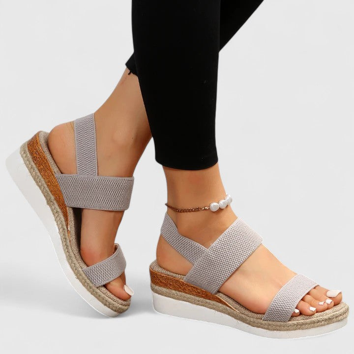 Ergonomic women's sandals with orthopaedic arch support, great for foot pain relief.